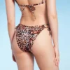 Women's Cut Out Strappy Side-Tie Extra High Leg Extra Cheeky Bikini Bottom - Wild Fable™ Multi Animal Print